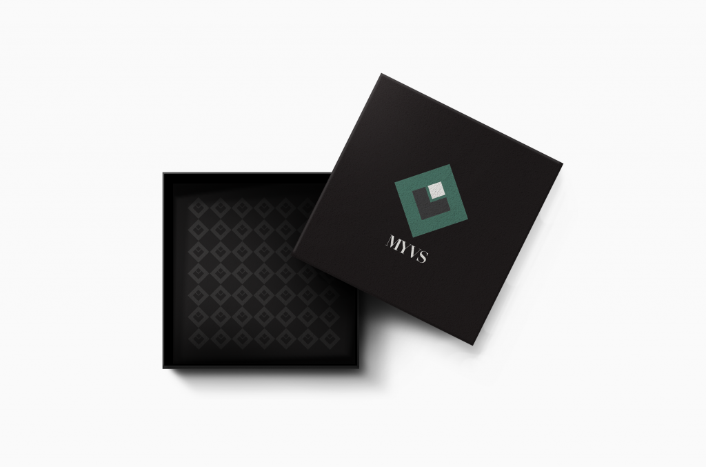 A black, square, open box with the MYVS logo on the lid
